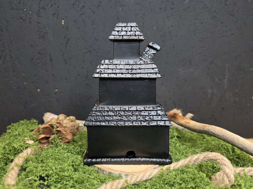 Kummitustalon mallinen suitsukepoltin.Keraaminen.