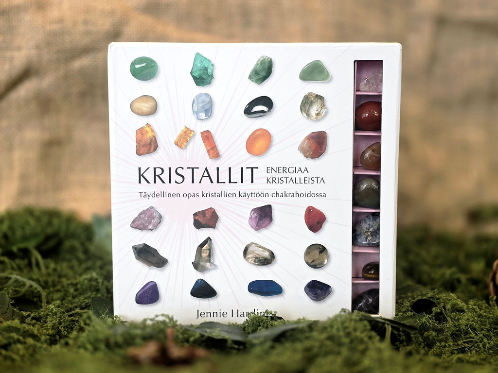 Kristalli, energiaa kristalleista, erilaisia kiviä ja oppaan sisältävä pakkaus. 